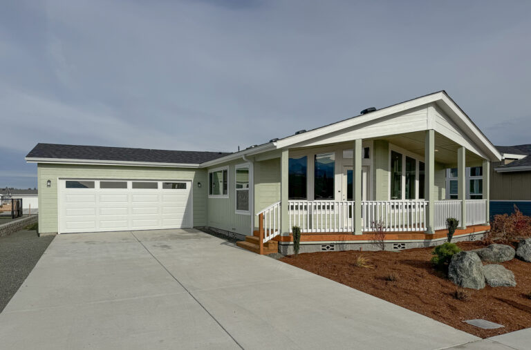 Finished manufactured home with an attached garage