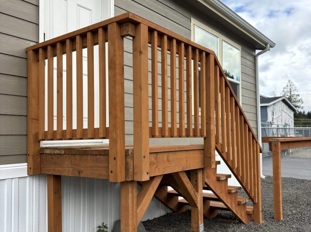 Custom staircase and vinyl skirting on a manufactured home in western washington
